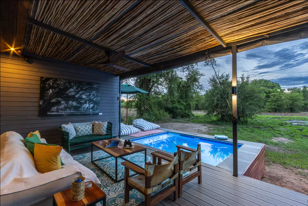 Veranda lounge with plunge pool at dusk