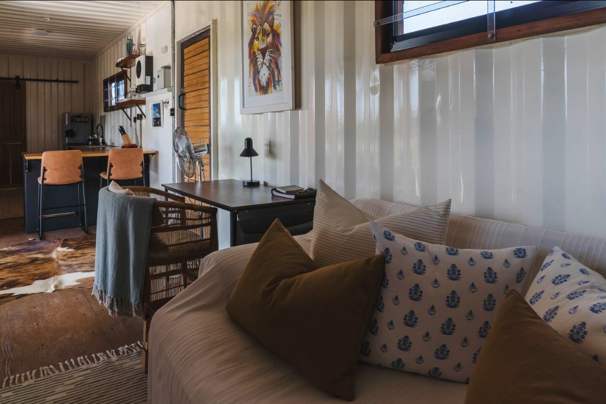 Living and kitchen area inside the container home